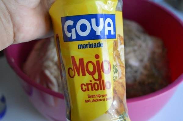 a container of mojo criollo is being shown.