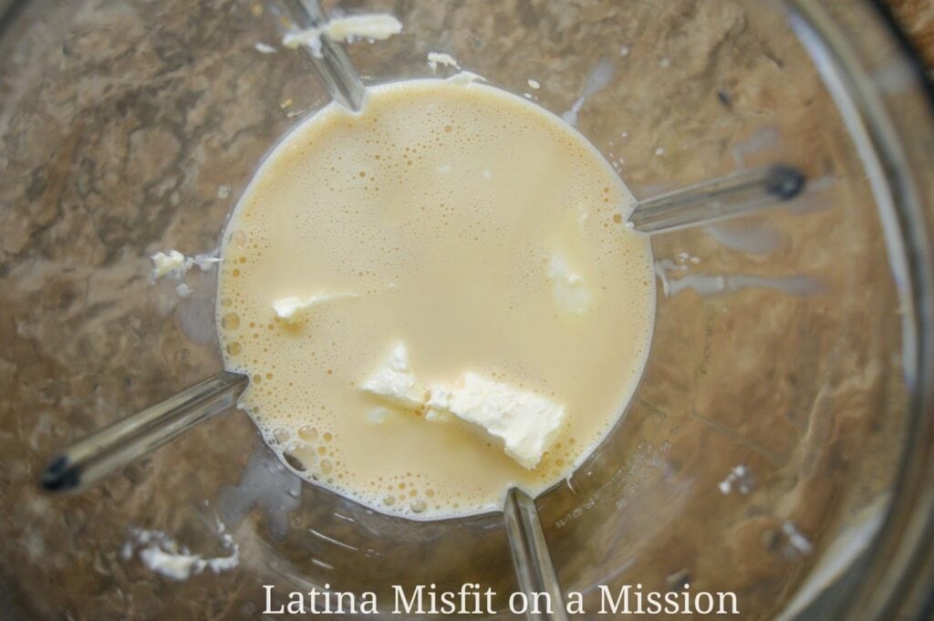 evaporated milk and cream cheese in a blender