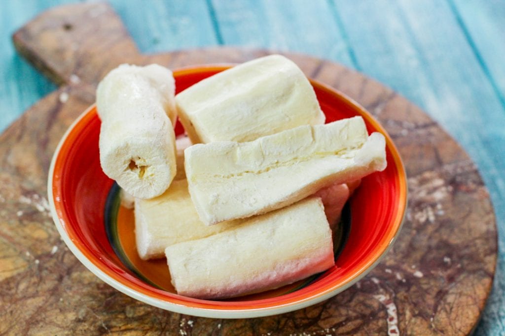 frozen yuca in a red bowl