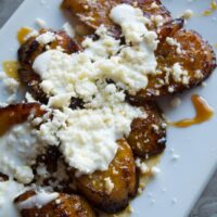 Mexican sweet orange honey plantains with cream and cheese.