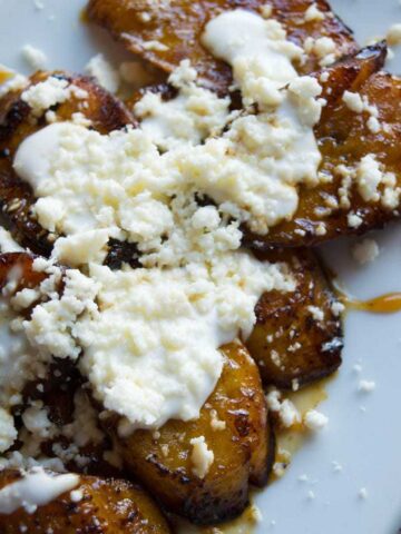 Mexican sweet orange honey plantains with cream and cheese.