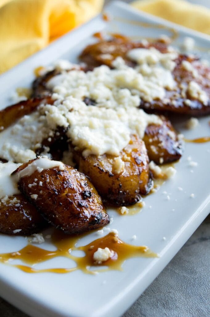 Mexican sweet orange honey plantains with cream and cheese.