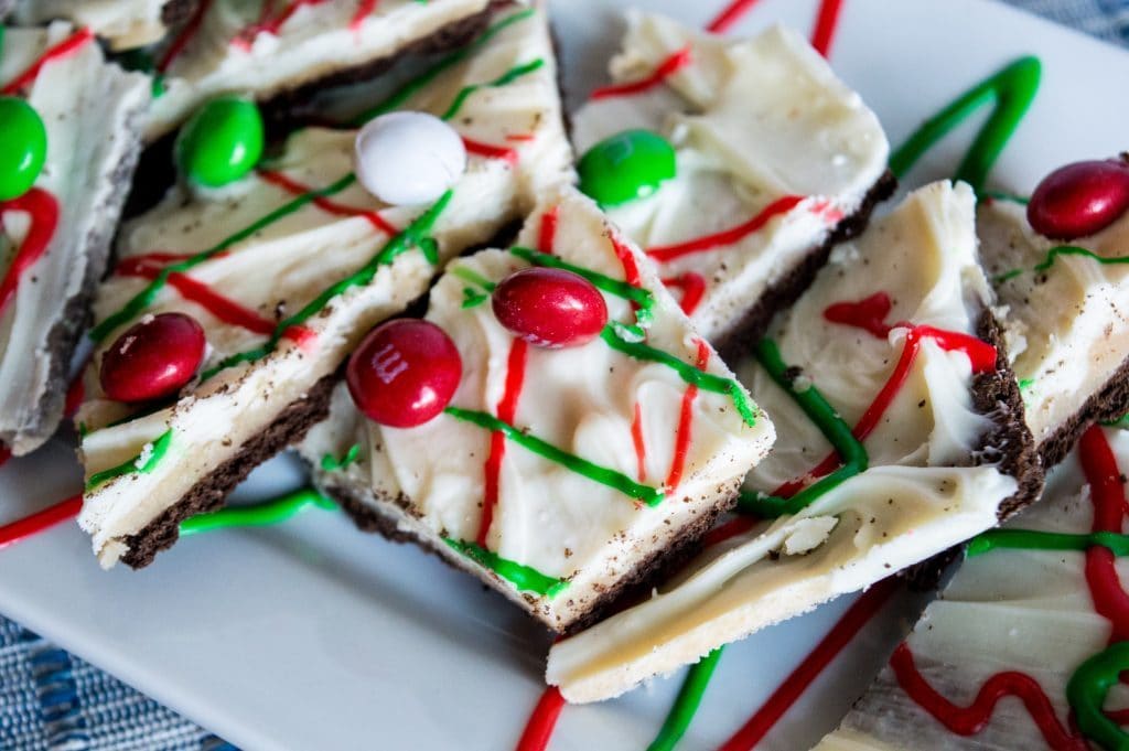 white chocolate M&M cookie bark on a white platter