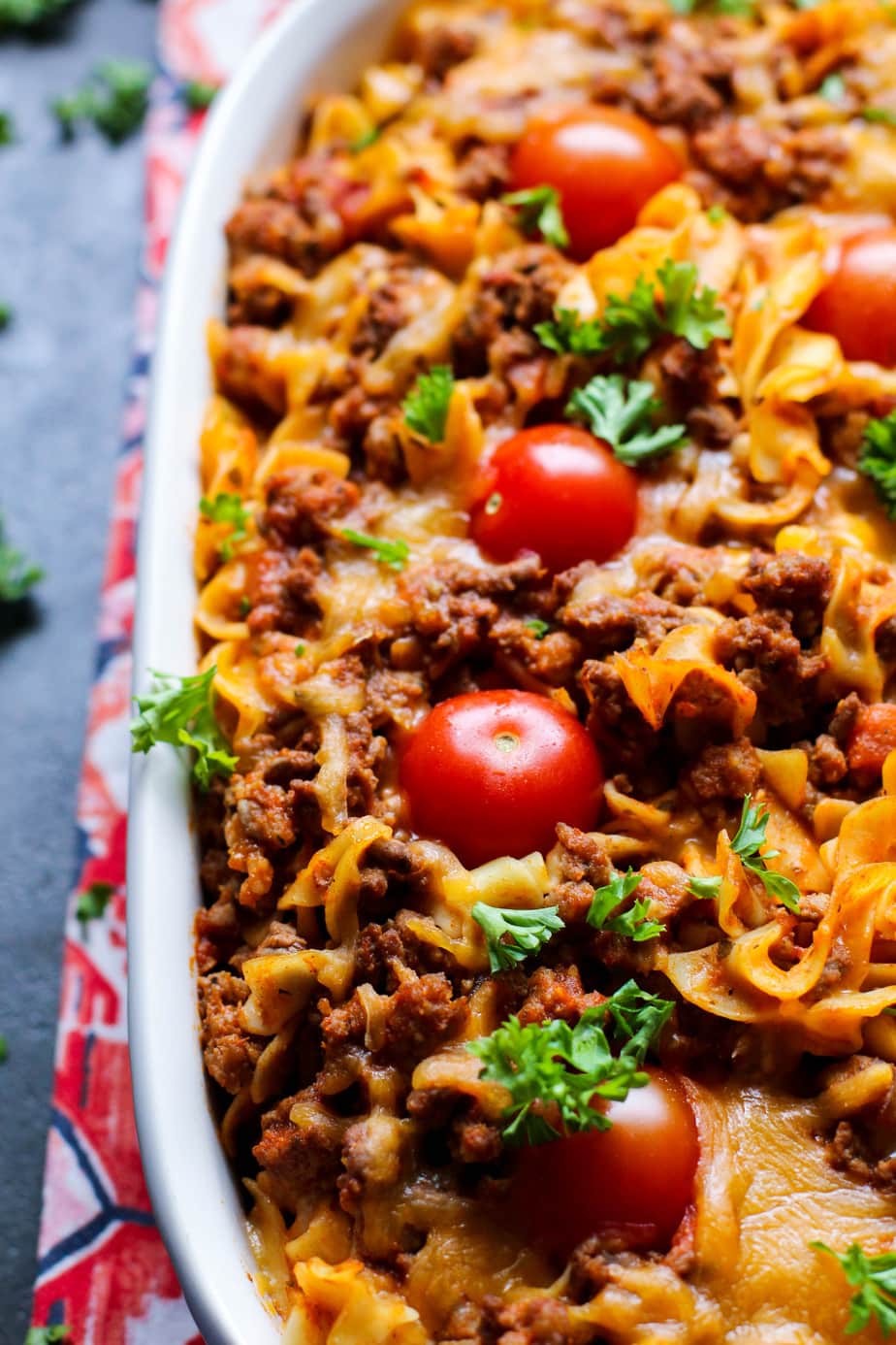 Rustic Puerto Rican Beef and Sausage Pasta Bake in a pan garnished with cilantro
