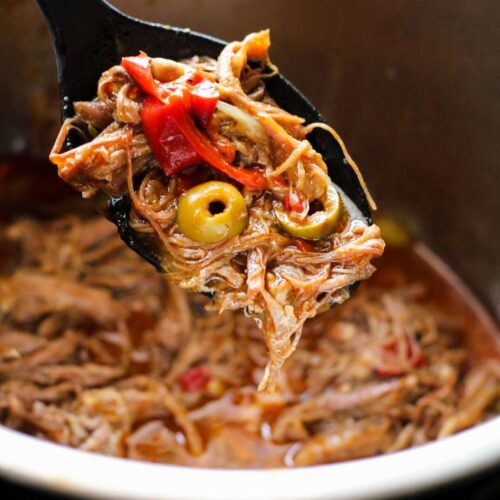 ropa vieja in a black spoon