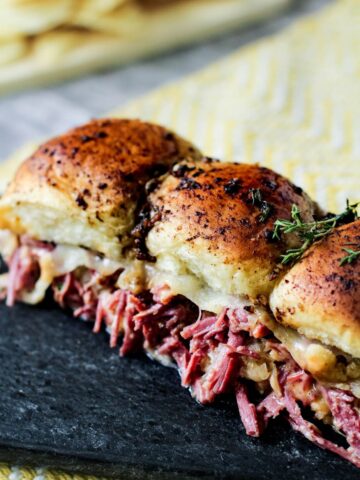 Roast Beef Reuben Sliders Recipe on a cutting board