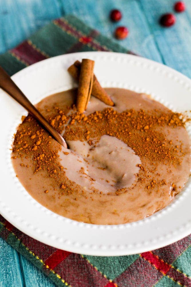Cuban Chocolate Maizena (Natilla) on a white plate with a spoon