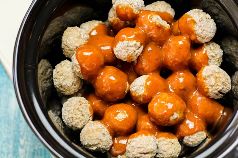 frozen meatballs and guava bbq sauce in a slow cooker