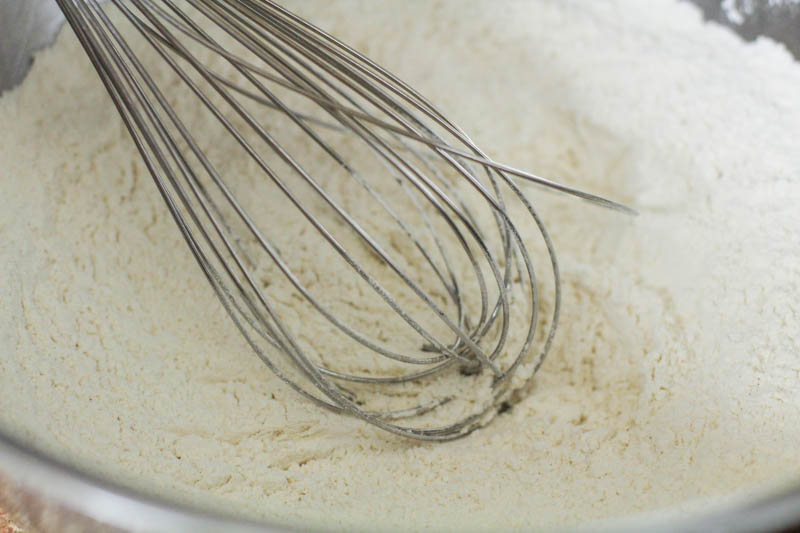 Bacalaitos batter in metal mixing bowl