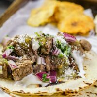 barbacoa taco on parchment paper