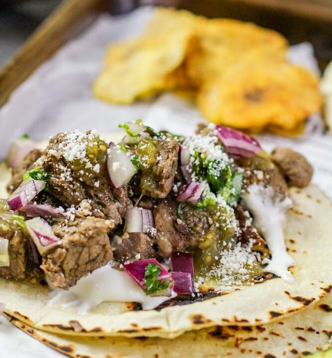 barbacoa taco on parchment paper