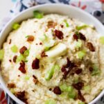 Loaded Cauliflower Potatoes in a white bowl