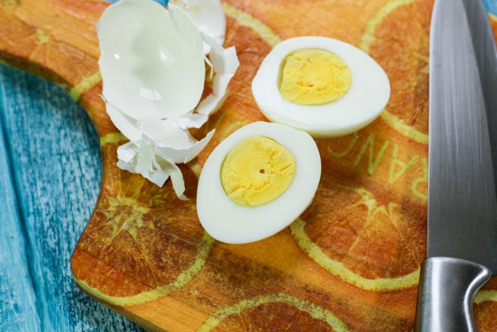 boiled eggs on a cutting board