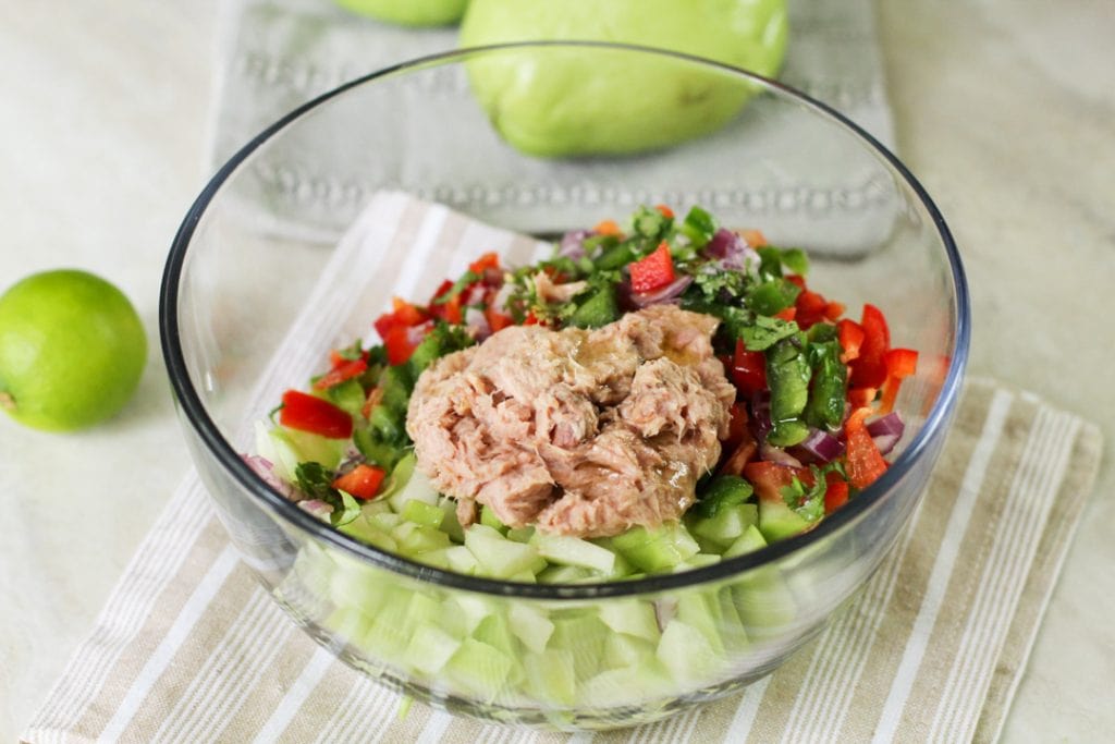 chayote tuna salad in a glass bowl