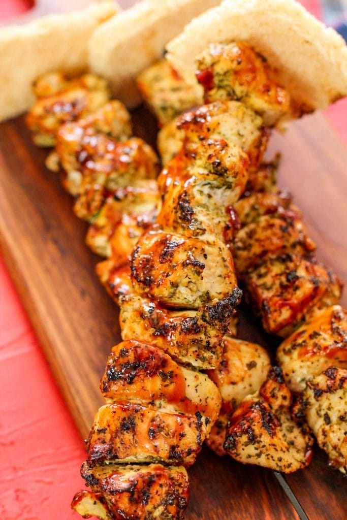 BBQ skewers with a red background