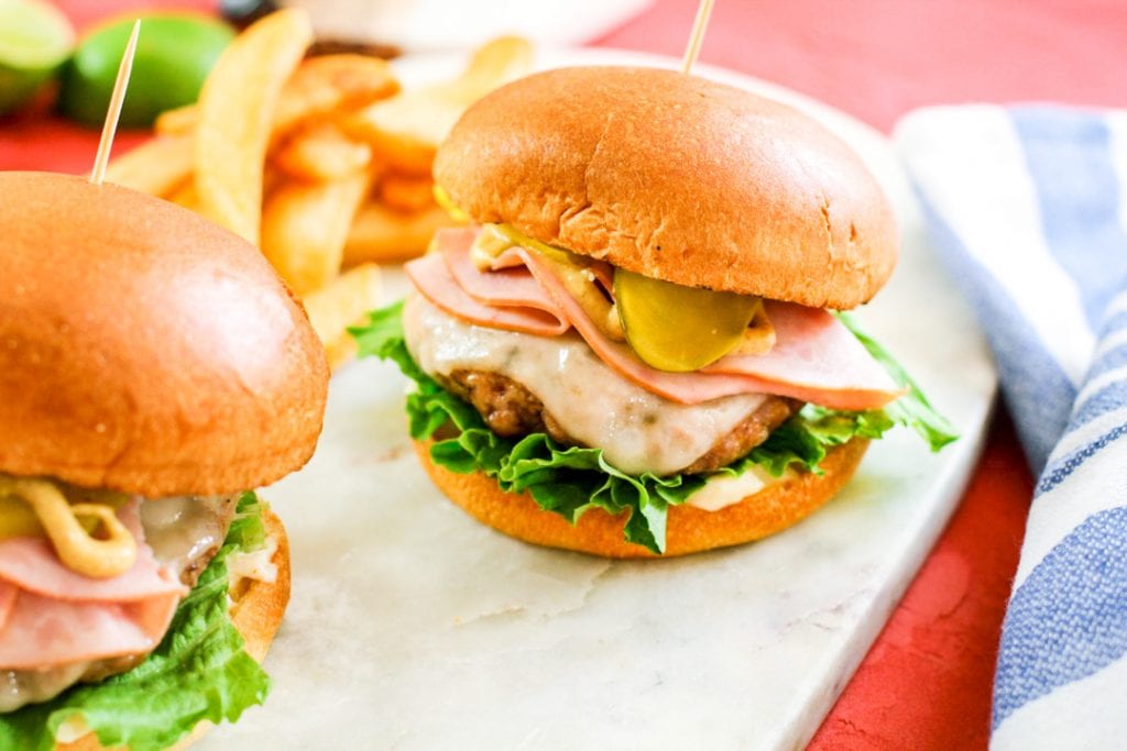 Cuban burger on a marble slat.