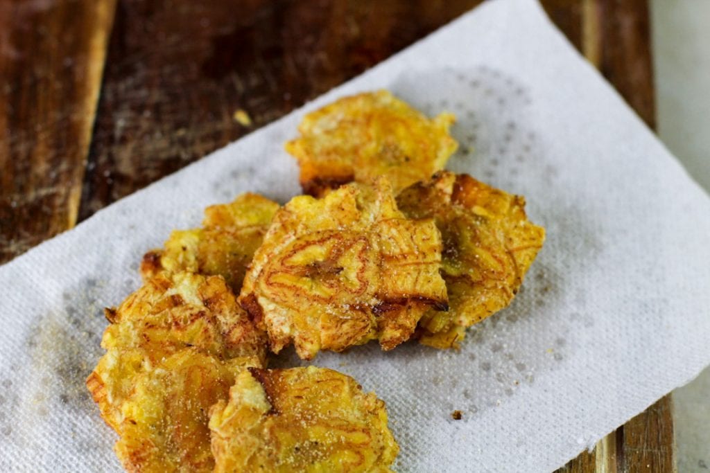 Crispy Garlic Tostones | Twice Fried Plantains - Latina Mom Meals