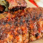 BBQ ribs on a wooden cutting board