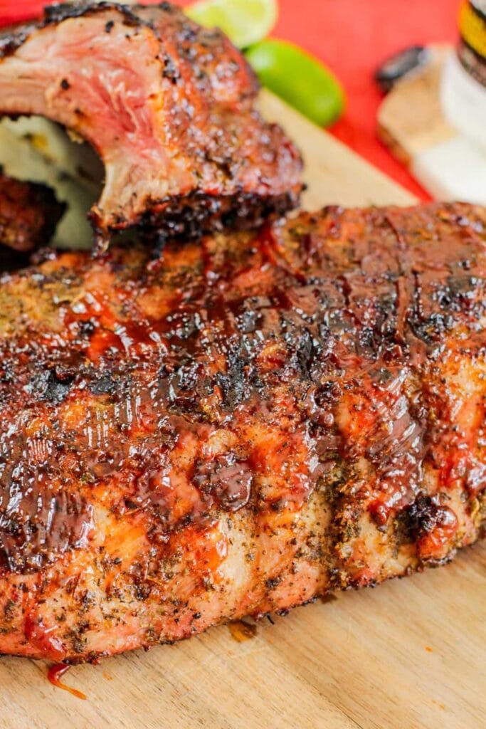 bbq ribs on a wooden cutting board