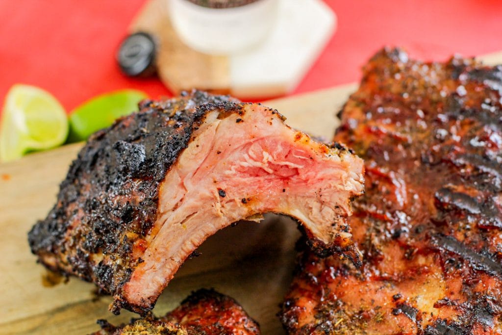 pork ribs on a wooden cutting board