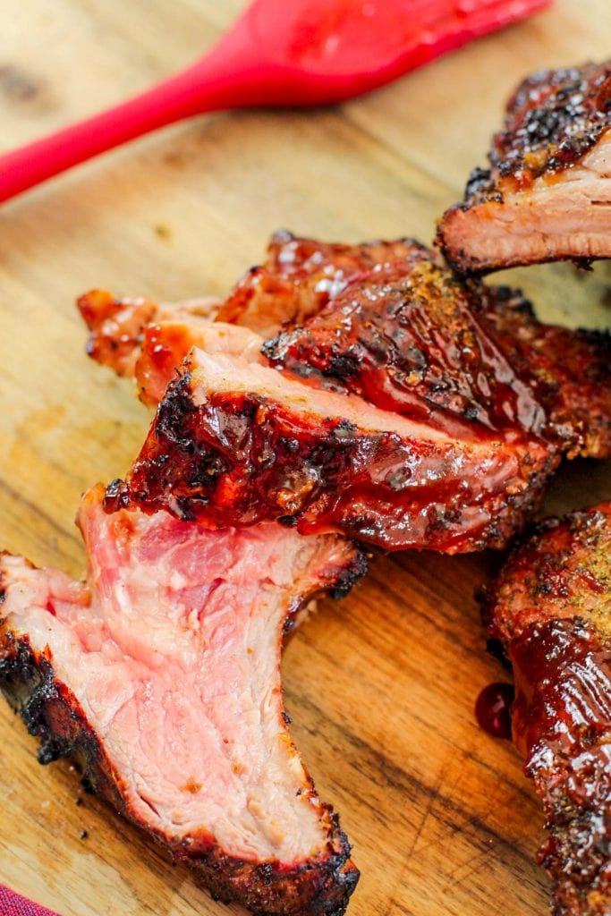 Pork ribs cut on a wooden cutting board