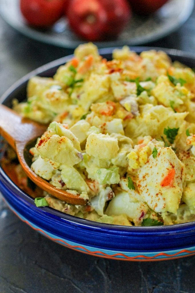 Potato Salad with a wooden spoon