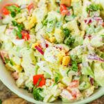 chayote egg salad in a white bowl