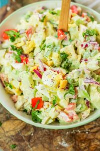 chayote egg salad in a white bowl