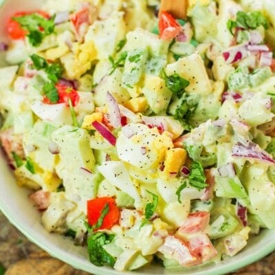 chayote egg salad in a white bowl