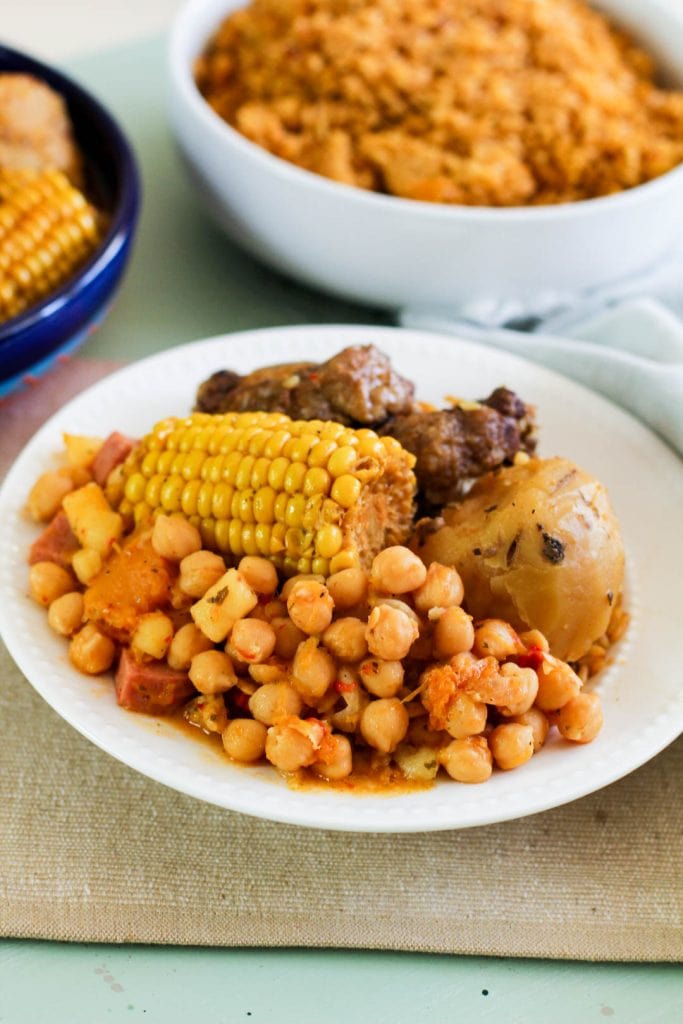 garbanzcos with corn oxtails and a potato