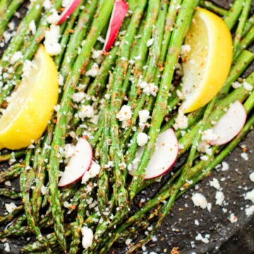 roasted asparagus in a cast iron pan