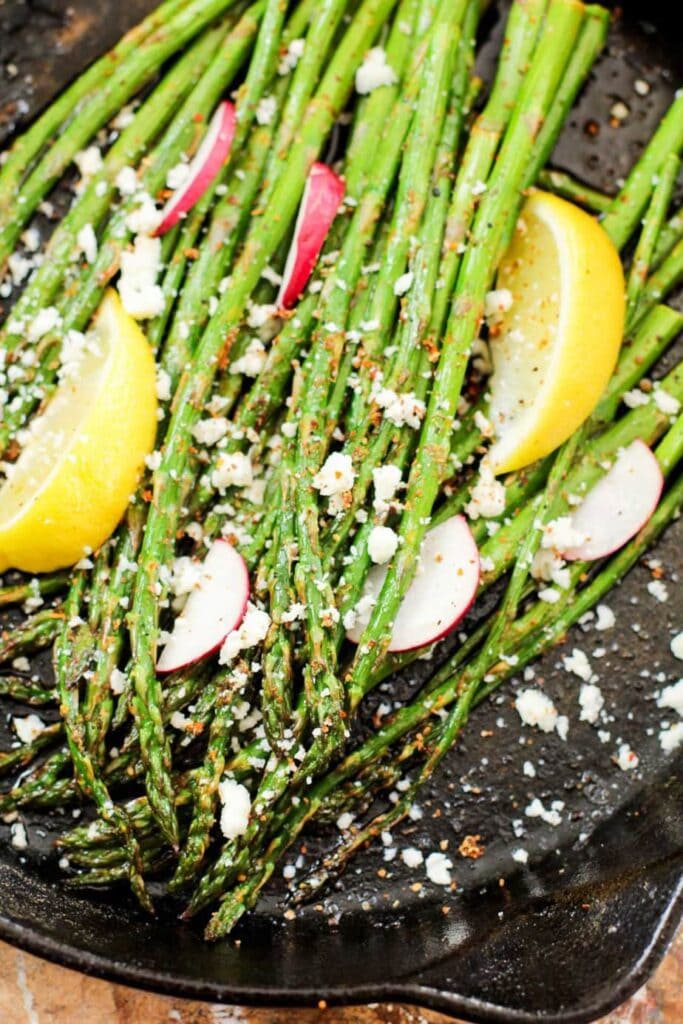 roasted asparagus in a cast iron pan