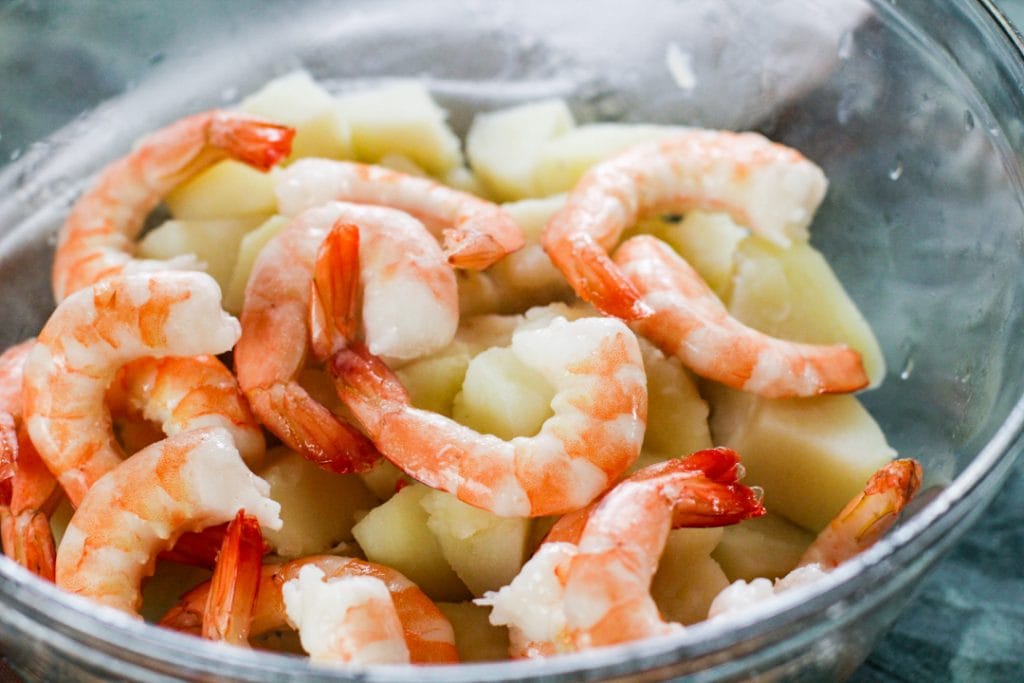 shrimp and potatoes in bowl