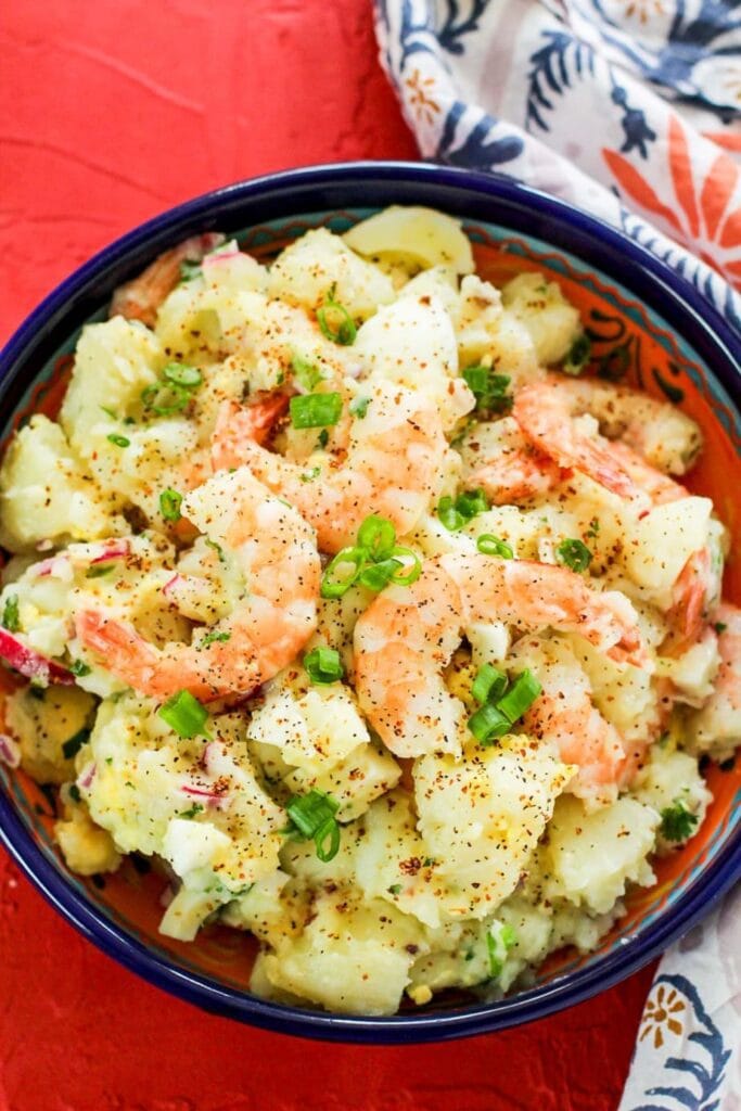 Shrimp potato salad in blue bowl