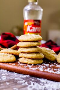 Coconut cookies stacked on top of each other.