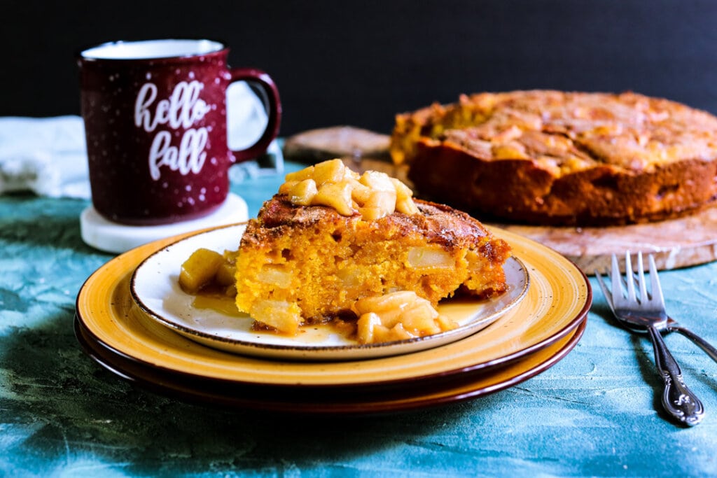 slice of apple pumpkin cake with caramel apple topping