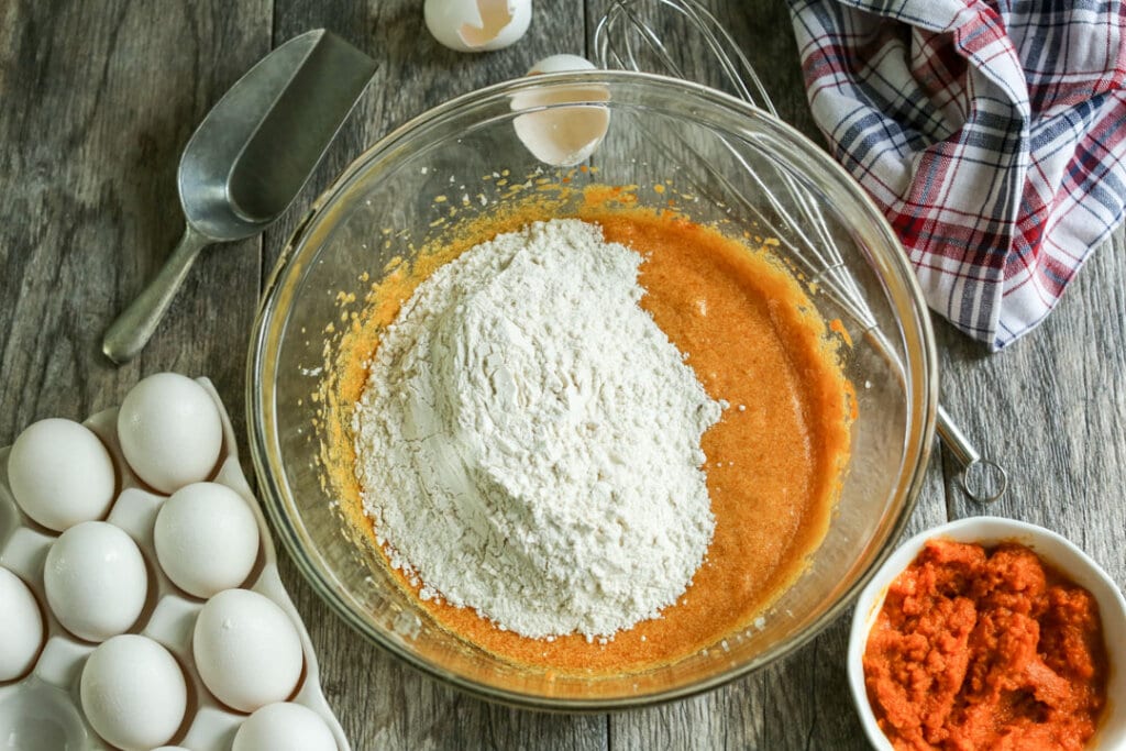 flour and pumpkin puree in a glass bowl