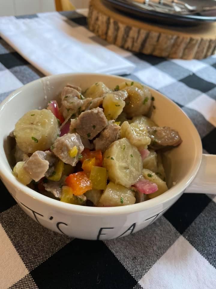 bananas gizzards and vegetables in a white bowl