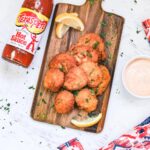 frituras on a wooden cutting board