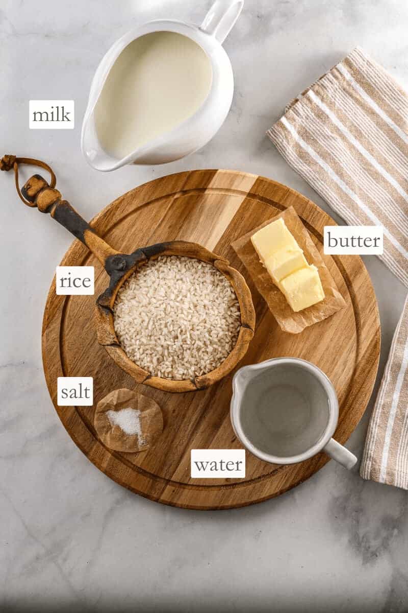Ingredients such as milk, butter, uncooked rice, and water are all together with individual labels.