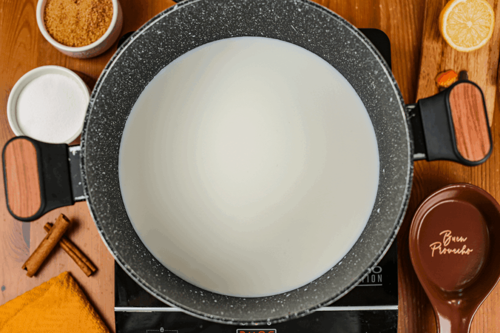 A pot of milk warming.