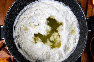 Milk proteins and whey begin to separate