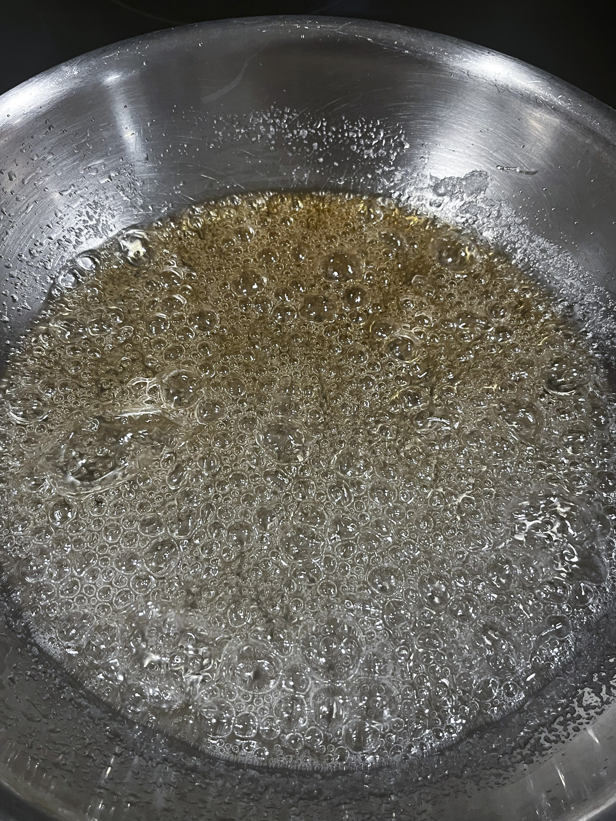 Sugar and Water Crystalizing in a pan to make caramel