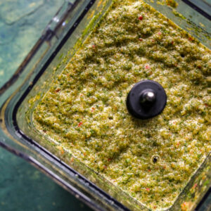 Close up of homemade sofrito in a food processor