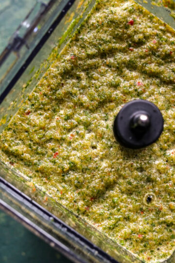 Close up of homemade sofrito in a food processor