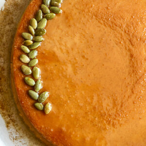 Close up of styled pepitas on Pumpkin Flan